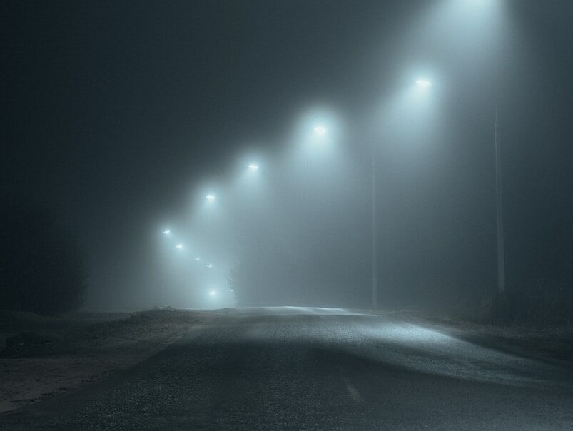 white light on road during night time